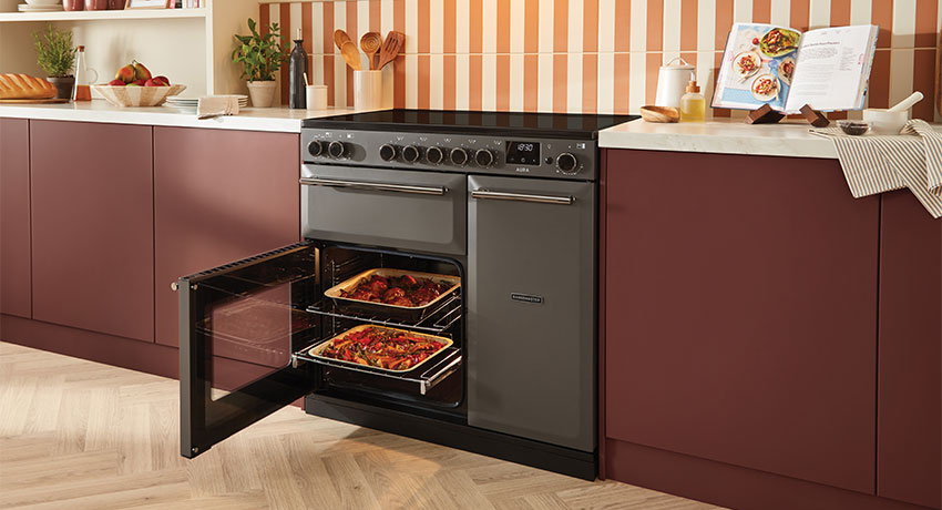 Rangemaster Aura range cooker with food cooking in the oven