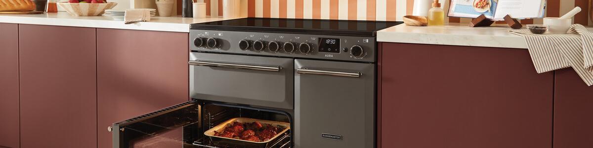 Rangemaster Aura range cooker with wooden cabinetry 