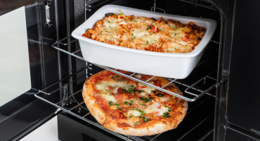 Kids will love making their own dough and creating pizza toppings