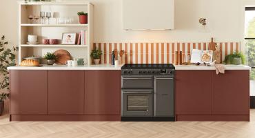 Rangemaster Aura in modern kitchen with burgundy cabinetry 
